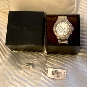 Michael Kors women’s silver color watch with diamond face